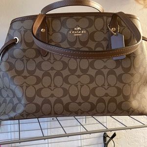 Coach bag. Like new no marks. Trying to get money for my moms funeral